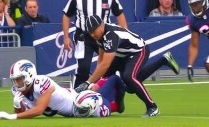 Getimg Texans Ruthless Defense Crushes Bills In Shocking Upset Referee Carted Off Field After Brutal Injury 1764166806